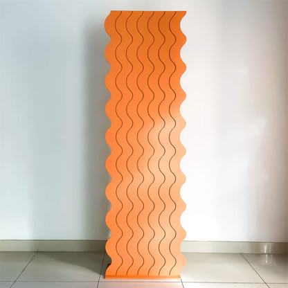 wavy orange backdrop standing on floor