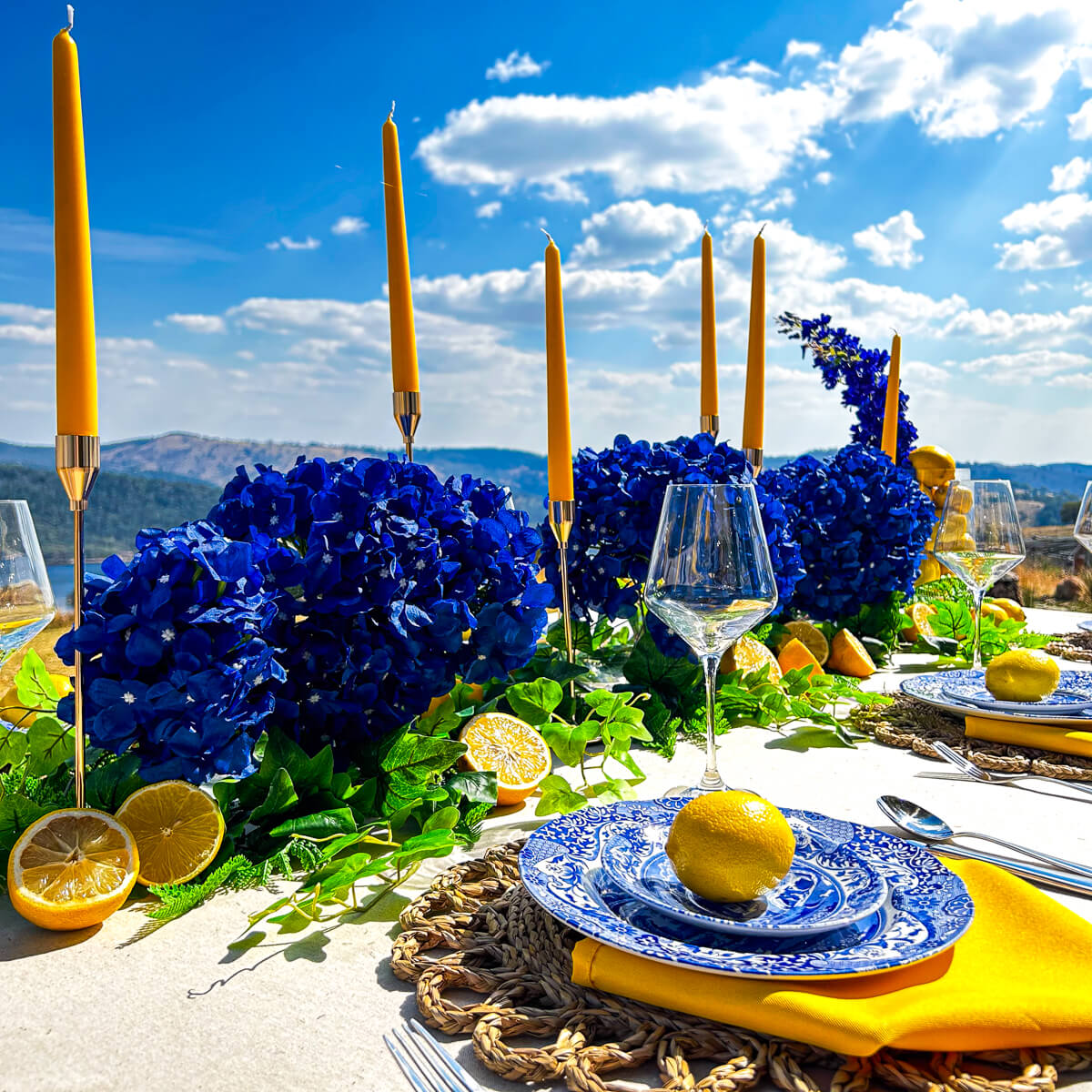 amalfi coast positano table setting with lemons on blue plates