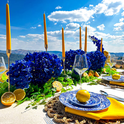 amalfi coast positano table setting with lemons on blue plates