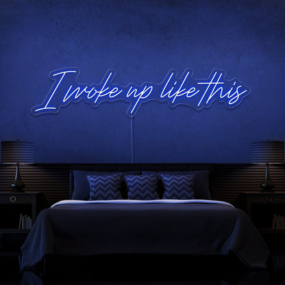 blue i woke up like this neon sign hanging on bedroom wall