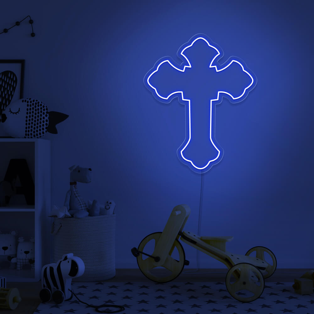 blue cross neon sign hanging on kids bedroom wall
