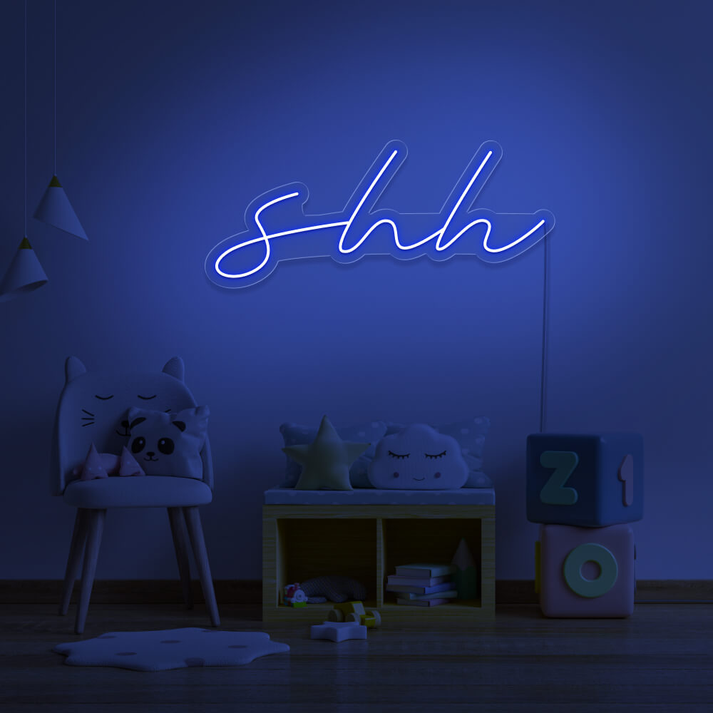 blue shh neon sign hanging on kids bedroom wall