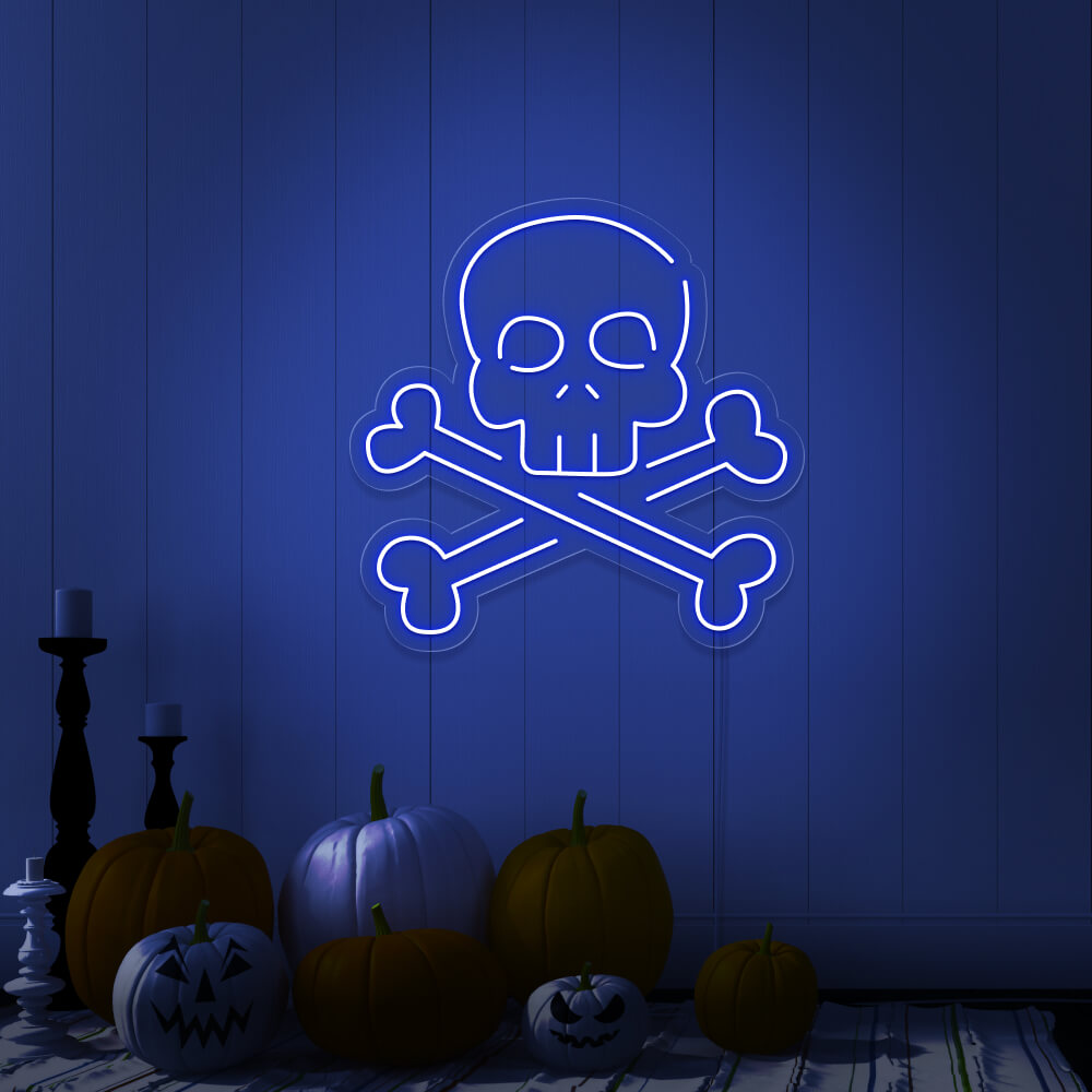 blue skull bones neon sign with pumpkins on floor