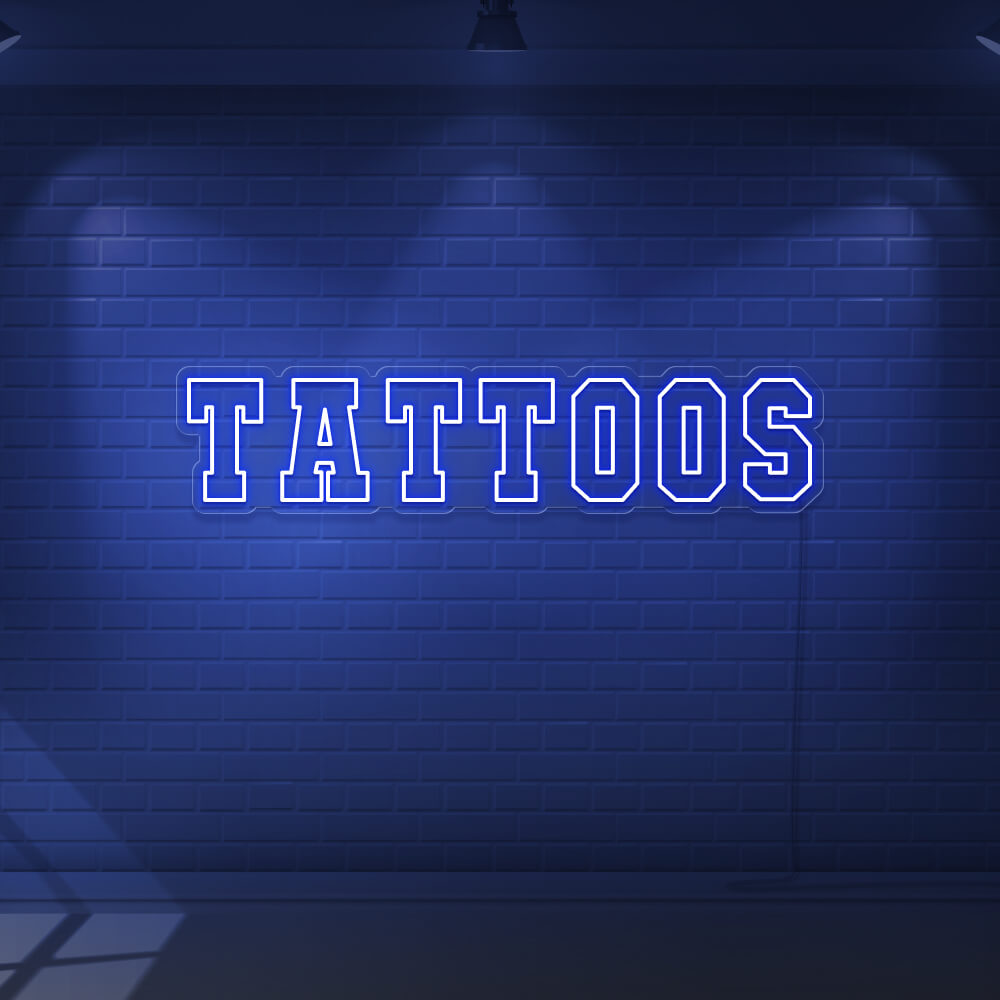 blue tattoos neon sign hanging on wall