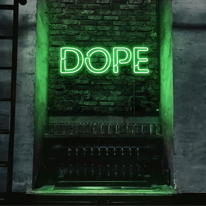 green dope neon sign hanging on bedroom wall