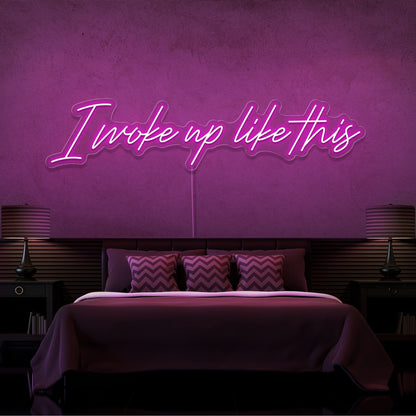 hot pink i woke up like this neon sign hanging on bedroom wall