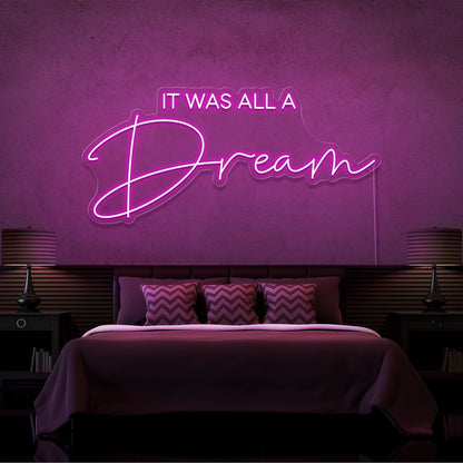 hot pink it was all a dream neon sign hanging on bedroom wall