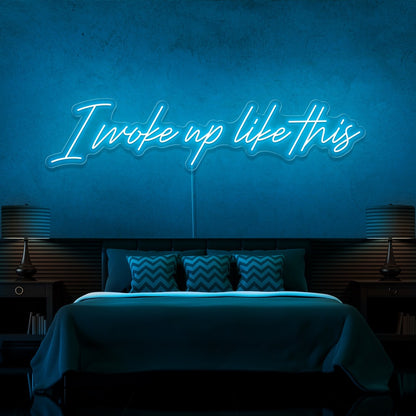 ice blue i woke up like this neon sign hanging on bedroom wall