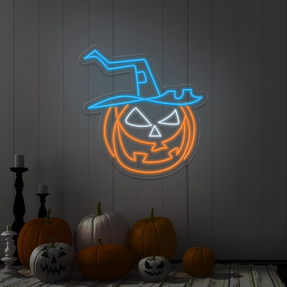 ice blue pumpkin hat neon sign hanging on wall next to pumpkins