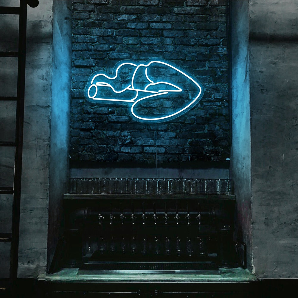 ice blue smoking lips neon sign hanging on bar wall