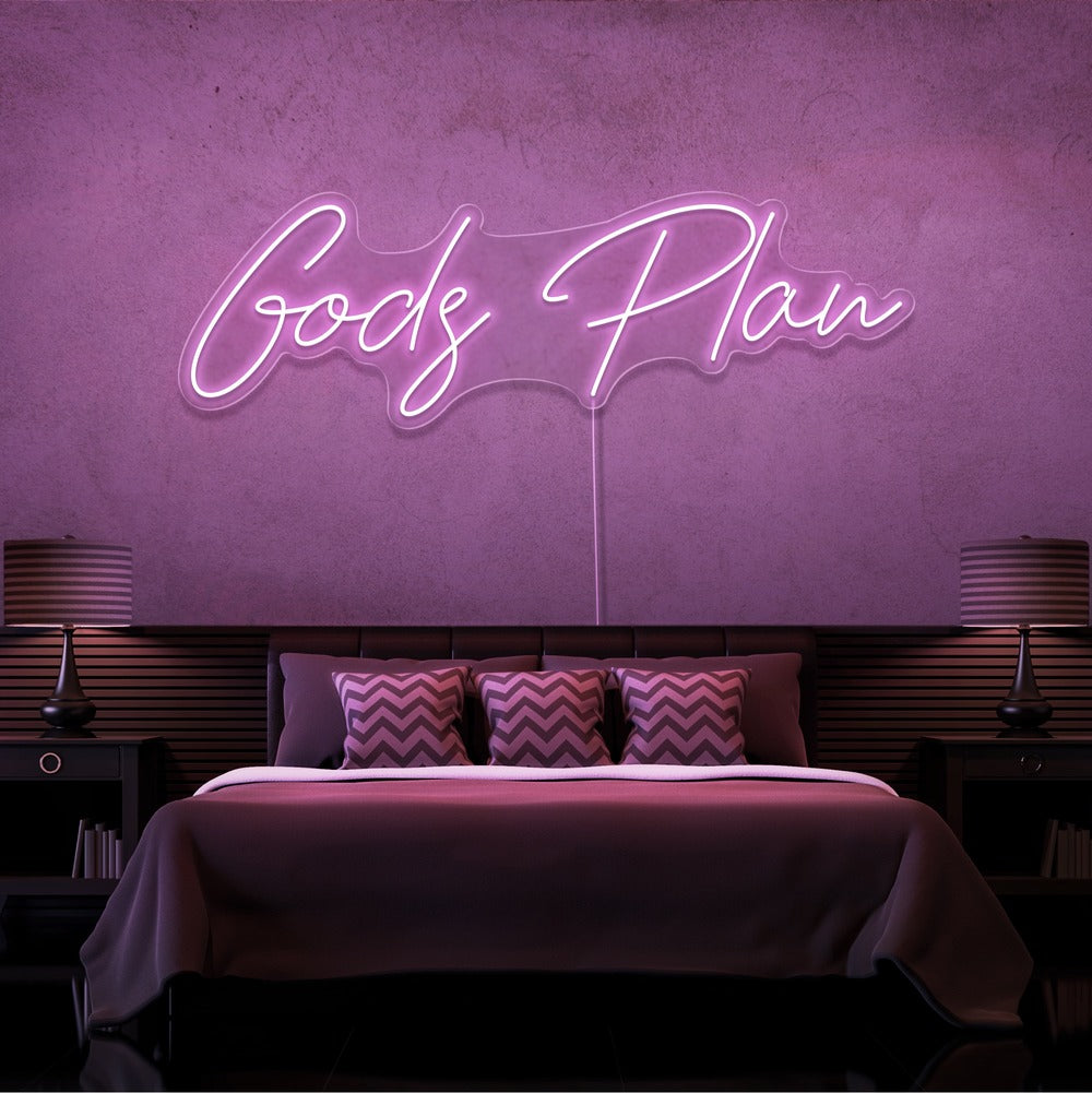 light pink gods plan neon sign hanging on bedroom wall