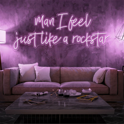 light pink man i feel just like a rockstar neon sign hanging on living room wall