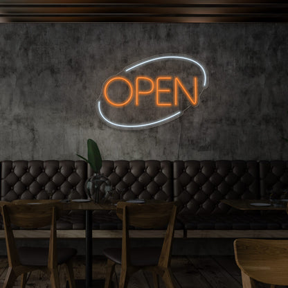 orange open neon sign hanging on restaurant wall