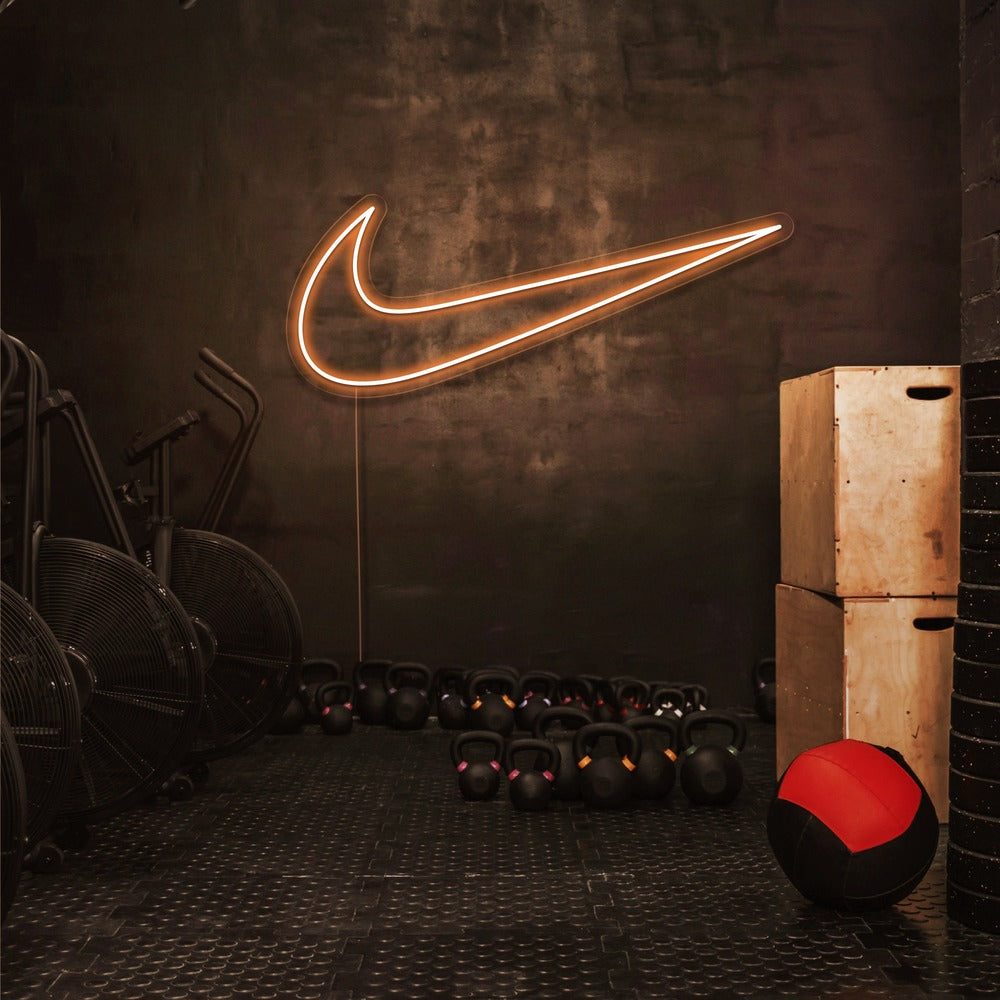 The shops nike sign