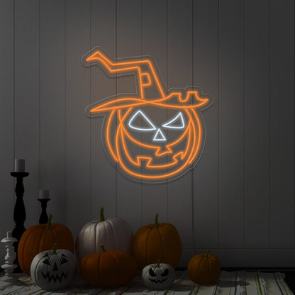 orange pumpkin hat neon sign hanging on wall next to pumpkins