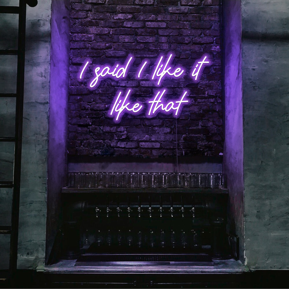 purple i said i like it like that neon sign hanging on bar wall