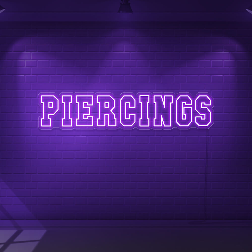 purple piercings neon sign hanging on wall