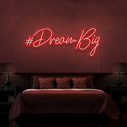 red dream big neon sign hanging on bedroom wall