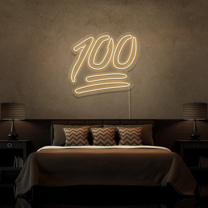 warm white 100 neon sign hanging on bedroom wall
