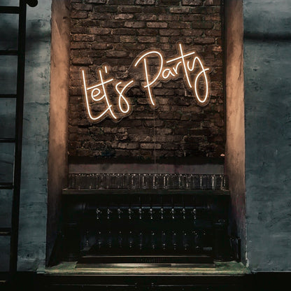 warm white lets party neon sign hanging on bar wall
