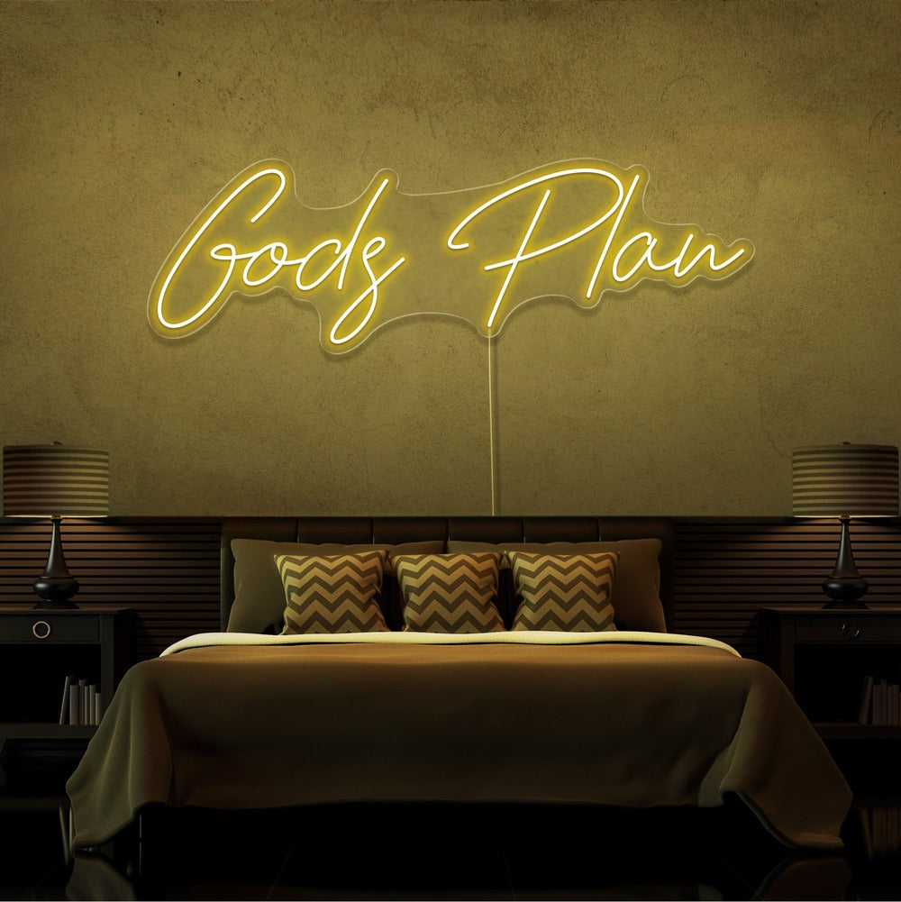 yellow gods plan neon sign hanging on bedroom wall