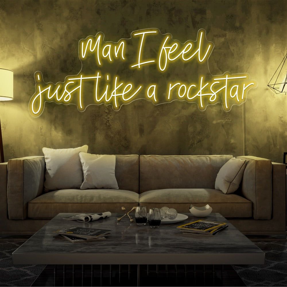 yellow man i feel just like a rockstar neon sign hanging on living room wall