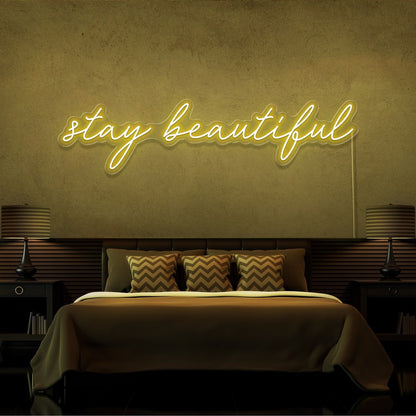 yellow beautiful neon sign hanging on bedroom wall